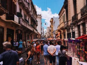 Navigating a busy city street can be easier with basic language skills. Image of a crowded street scene